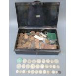 A metal money / cash box with key containing a collection of UK & some overseas coins,