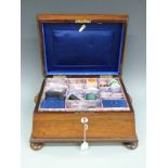 A 19thC rosewood sewing or workbox with fitted interior,