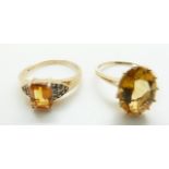 A 9ct gold ring set with an oval citrine and a 9ct gold ring set with a citrine and diamonds,