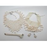 Two pearl necklaces/ chokers and pearl bracelet and earrings