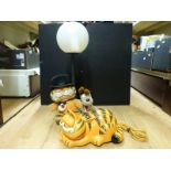 A Garfield novelty telephone together with a Garfield and Odie table lamp