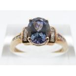 A 9ct gold ring set with a mystic topaz and diamonds, size O/P, 2.