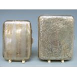 Two hallmarked silver cigarette cases, one Chester 1908 the other Birmingham 1930,
