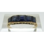 A 9ct gold Edwardian ring set with five square cut graduated sapphires, size M, 2.