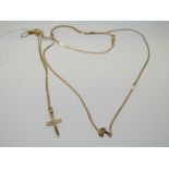 A 9ct gold ribbon necklace and matching bracelet, 9ct gold cross pendant and chain, 2.