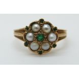 A 9ct gold ring set with pearls and emeralds, size P, 3.