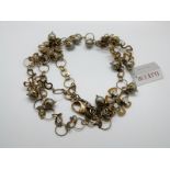 A Bulatti necklace in a floral design set with faux pearls and paste