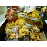 Three large Garfield soft toys together with a quantity of smaller and miniature examples including