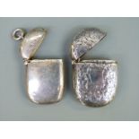 Two Victorian hallmarked silver vestas, one with engraved foliate decoration,