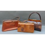 Three vintage leather, lizard and 1950's alligator handbags,