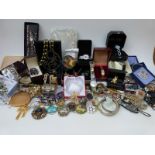 A large collection of costume jewellery including amethyst brooch, rock crystal pendant,