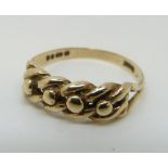 A 9ct gold keeper ring, 2.
