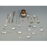 A Scottish hallmarked silver spoon, other silver spoons, silver and mother of pearl pickle forks,