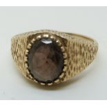 A 9ct gold ring set with a smoky quartz, 3.