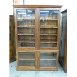 A glazed mahogany cupboard/bookcase,