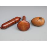 Three turned wood sewing and darning items comprising bobbin case with gilt script Jane Stratford,