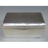 A hallmarked silver cigarette box,