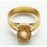 A 22ct gold ring set with citrine, size Q/R, 3.