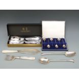 A cased set of six hallmarked silver coffee bean spoons,