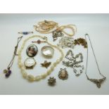 A collection of costume jewellery to include gold plated brooch, diamanté, marcasite,
