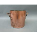 A 19thC twin-handled copper saucepan,