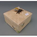 A Crown Devon honeycomb box with bee finial