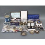 A quantity of silver plated ware including cased sets, two napkin rings, cruets, egg cups,