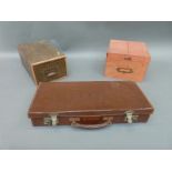 Vintage filing boxes and a small leather case