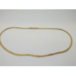 A 14k gold ribbon necklace, 7.