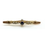 A 9ct gold Edwardian brooch set with blue paste and seed pearls, 2.