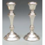 A pair of hallmarked silver candlesticks, Birmingham 1972 maker W I Broadway & Co,