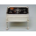 An Edwardian hallmarked silver and tortoiseshell miniature trinket box raised on cabriole legs with