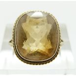 A 9ct gold ring set with a citrine, size O/P, 3.