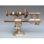 A nickel plated watchmakers, or similar, bench lathe with Burnerd chuck,