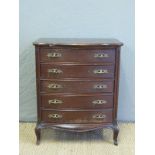 A small chest of five drawers,