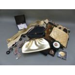 A collection of evening bags scarves, belts by Karl Olsen, gold evening shawl,