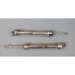 Two dumbell shaped hallmarked silver retractable button hooks
