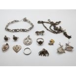 A collection of silver jewellery to include bracelet set with marcasite, ring,