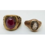 A 9ct gold ring set with a ruby cabochon (size N) and a 9ct gold ring set with a smoky quartz (size