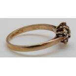 A 9ct gold ring set with diamonds in a cluster (size L)