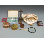 A boxed Ronson Standard lighter, a collection of lace and textiles, a brass crucifix,