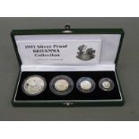 A cased 1997 Britannia silver proof set with certificate, comprising four coins,