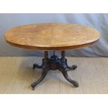 A Victorian inlaid walnut oval breakfast table,