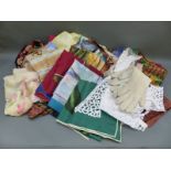 A collection of ladies scarves including silk examples together with other textiles including