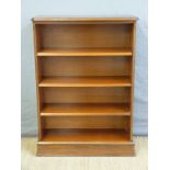 A mahogany bookcase with adjustable shelves,