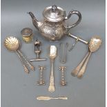 A hallmarked silver lidded dressing table pot, plated teapot, cutlery,