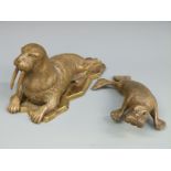 A 19thC bronze walrus inkwell with hinged head,