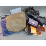 A group of handbags and purses to include Italian leather etc