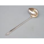 A Georg Jensen hallmarked silver sauce ladle with GI and 925 marks and also import marks for London
