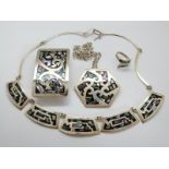 A silver necklace set with mosaic abalone, with matching ring,